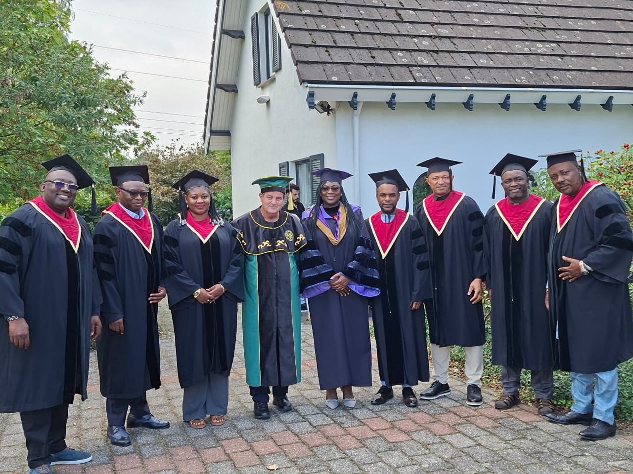 FUNIC staff in academic regalia with NLBA colleagues during the mobility week